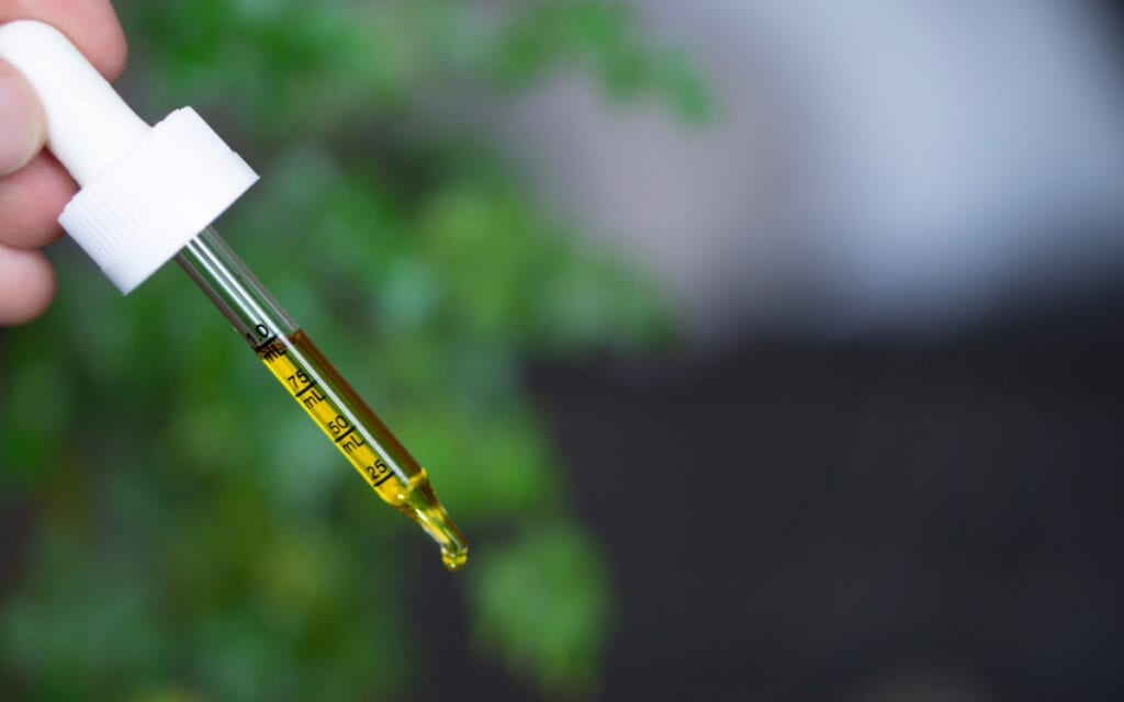 cbd oil in a dropper, different types of cbd