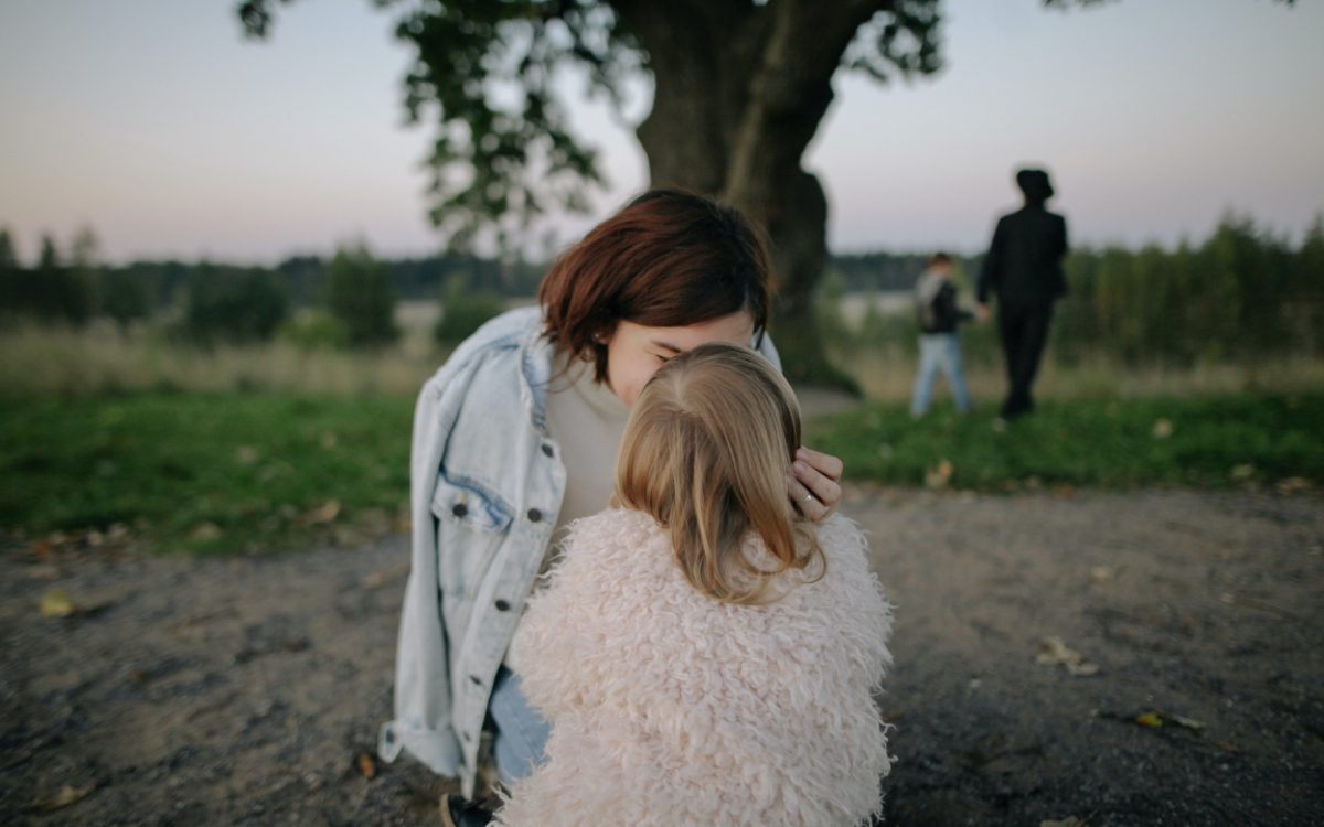 Mother's Day gift idea. Mom hugging daughter