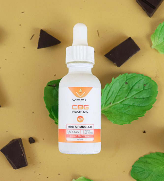 CBG hemp oil mint chocolate flavor 1500mg with chocolates and leaves background